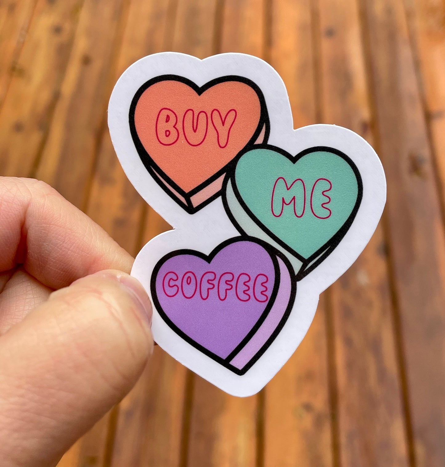 Vinyl sticker featuring funny Valentine candy saying 'Buy Me Coffee' for teachers with a sense of humor-close up
